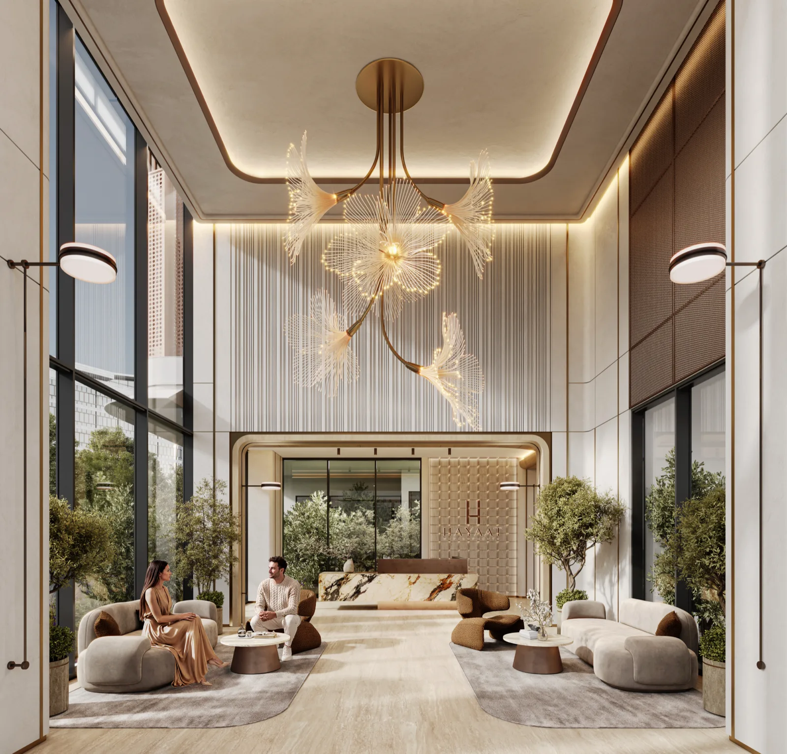 Double-height entrance lobby at Isolana with a sculptural chandelier, lounge seating and the reception beyond