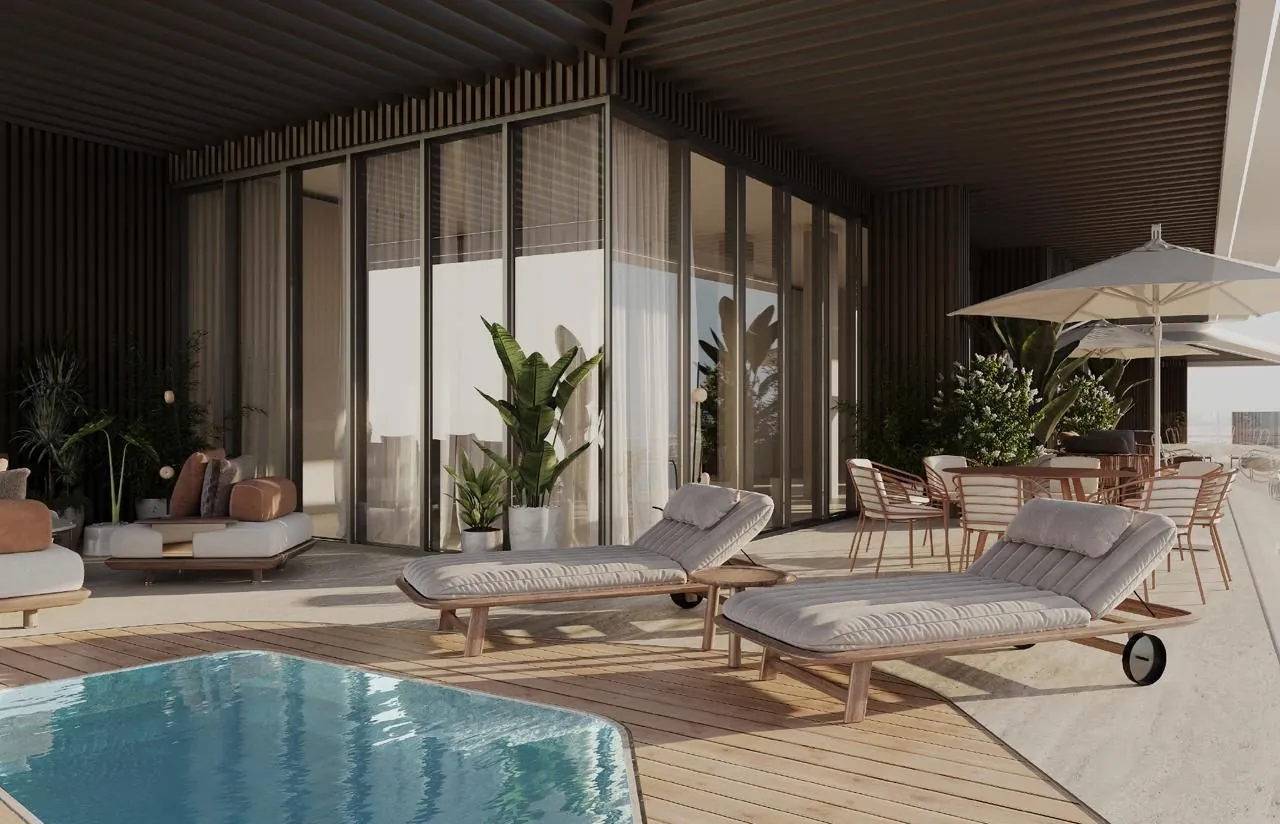 Private terrace with plunge pool and sun loungers at Isolana