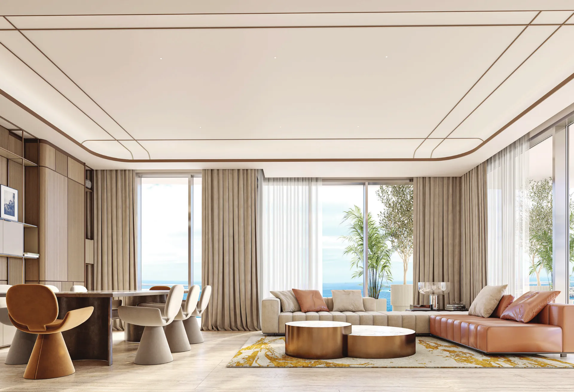 Three-bedroom living and dining room at Isolana with sculpted dining chairs, a leather sofa and sea views